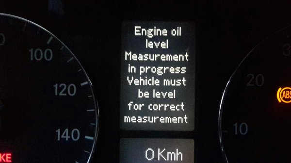 Engine oil level Measurement in progress Vehicle must be level for correct measurement.jpg